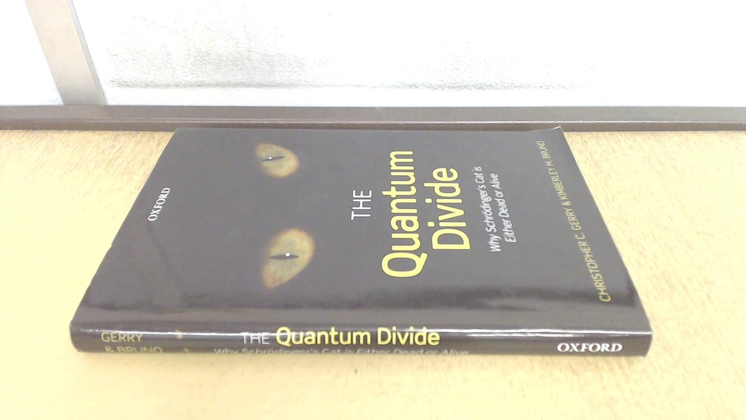 Buy The Quantum Divide: Why Schrödinger's Cat is Either Dead or Alive (English, Paperback, Christopher C. Gerry, Kimberley M. Bruno) Online at Best Price - BookBajar